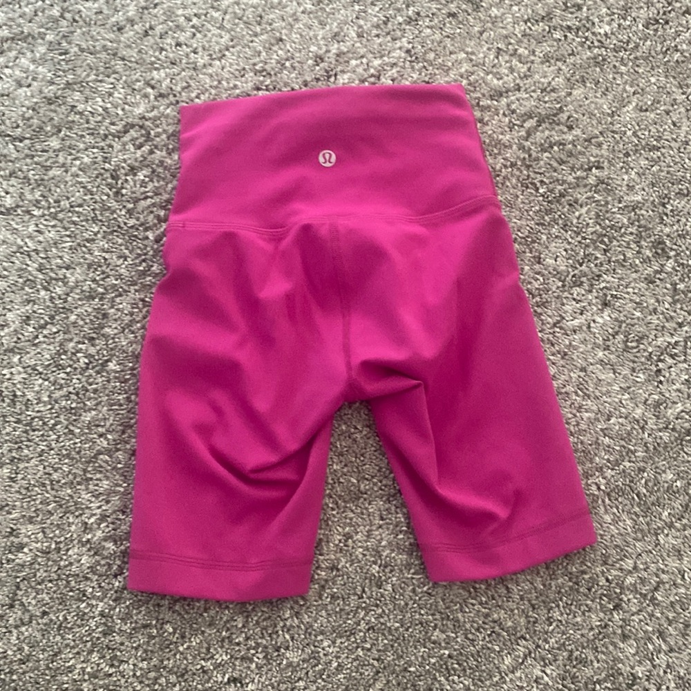 Pink lululemon biker shorts